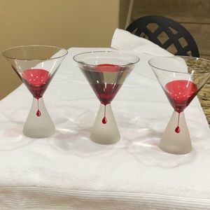 3 clear and red martini glasses
